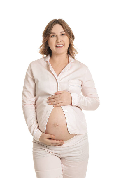 Beyaz arka planda güzel hamile bir kadın - Fotoğraf, Görsel