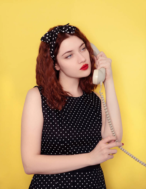 young beautiful woman with red hair  posing talking on phone - Foto, Imagem