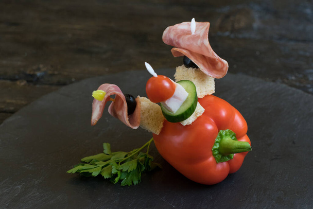 Canapes on a big red bell pepper - Photo, Image