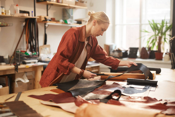 Woman Cutting Out Leather - Photo, Image