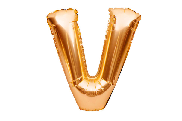 Letter V made of golden inflatable helium balloon isolated on white. Gold foil balloon font part of full alphabet set of upper case letters - Фото, изображение