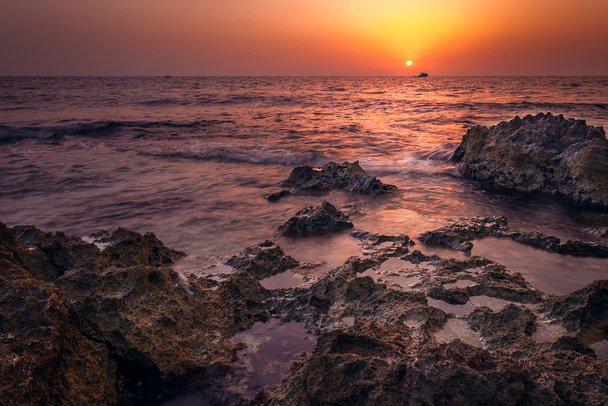 закат над морем - Фото, изображение