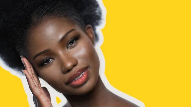 Beauty Dark Skinned Woman Isolated On Yellow Back - 写真・画像