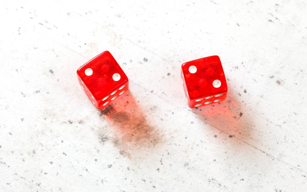 Two red craps dices showing Hard Four / Little Joe (double number two) overhead shot on white board - Valokuva, kuva