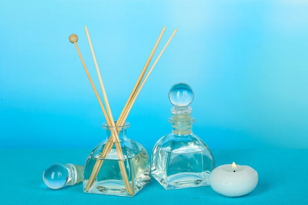 Aromatic sticks for home on blue background - Fotoğraf, Görsel