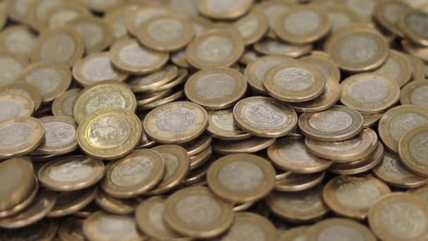 Mexican coins falling over other mexican coins - Footage, Video