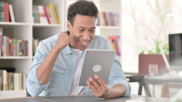 Young African American Man Celebrating Success on Tablet, Winning - Foto, immagini