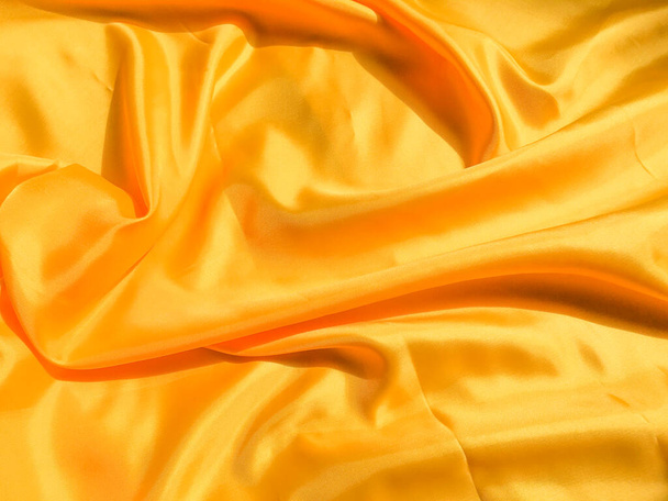 Yellow silk or satin texture background with copy space for design - Zdjęcie, obraz