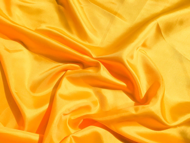 Tasarım ve sanat çalışmaları için kopyalama alanı olan güzel sarı ipek ya da saten desen arkaplanı  - Fotoğraf, Görsel