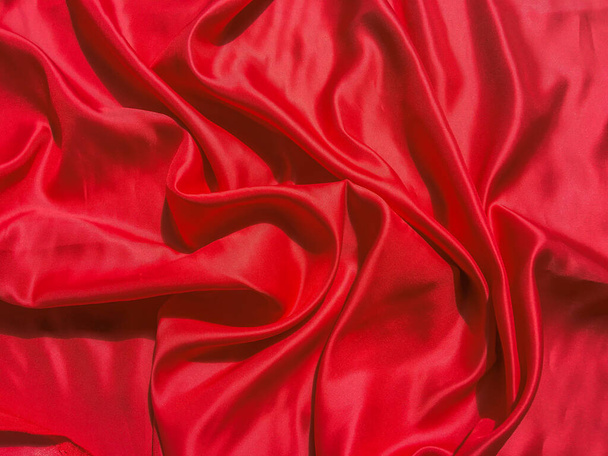 Czerwona tkanina tekstura tła z miejsca na ksero. Walentynki lub Boże Narodzenie projekt tapety - Zdjęcie, obraz