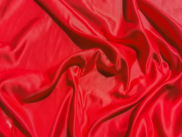 Modern luxus vörös szövet textúra háttér. Valentin-nap vagy Karácsony napja tapéta tervezés - Fotó, kép