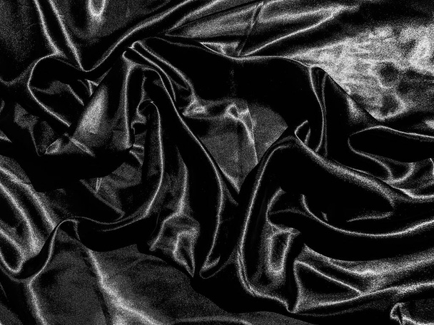 Fond de texture satinée noire avec onde liquide ou plis ondulés. Conception de papier peint
 - Photo, image