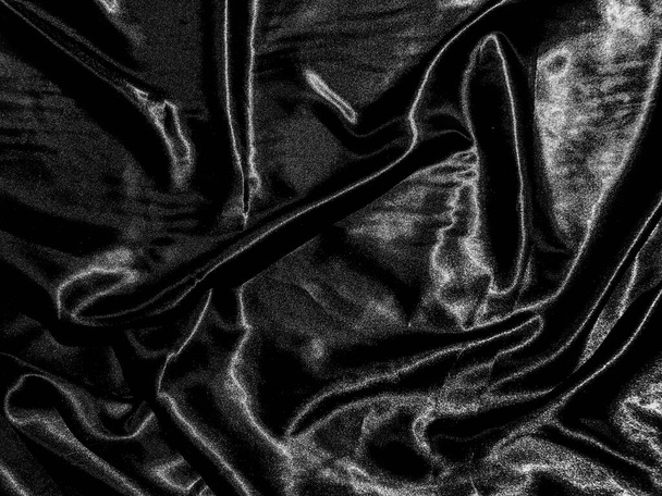 Fekete ruha vagy szövet textúra háttér folyékony hullám vagy hullámos redők. Tapétarajzolás - Fotó, kép