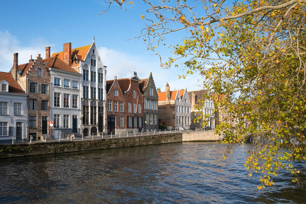 Historic buildings along the canals of Bruges, Belgium - Fotó, kép