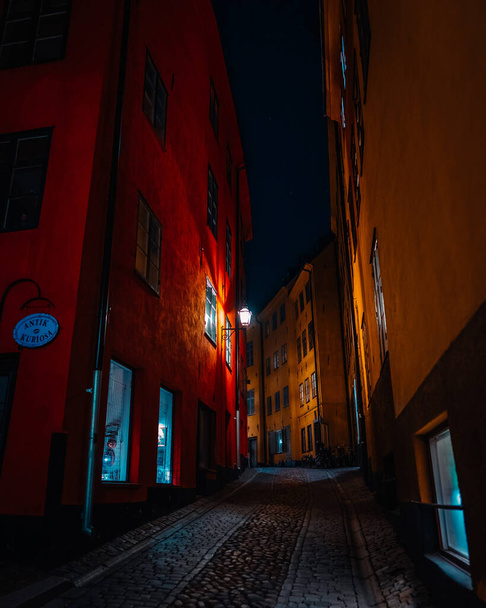 Beautiful cozy night narrow street in Gamla Stan - old town of Stockholm. 14 February 2020, Stockholm Sweden - Foto, imagen