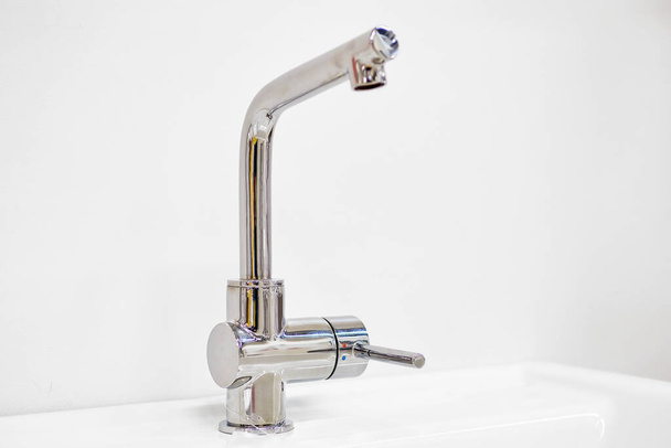 Modern metal faucet for water supply. Close up. - Photo, Image