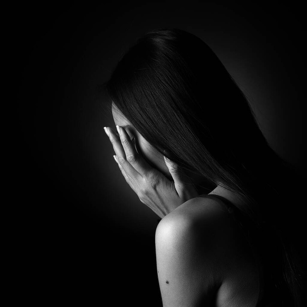 Portrait of Slim Asian Woman black straight hair, Abstract high low exposure contrast shadow, broken heart lonely lady can cry from falling in love and waiting for love to come back - Photo, Image