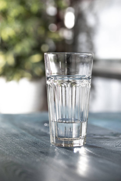 A simple glass of water in the kitchen - Photo, image