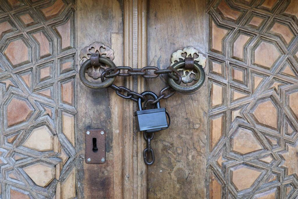 Skopje, Central / North Macedonia - Ottoman gate at the entrance of Mustafa Pasha Mosque locked by a chain - Photo, Image
