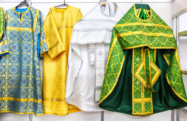 Different solemn colorful orthodox priest's robes, clergyman's embroidered robe. Russian Orthodox Church - Photo, Image