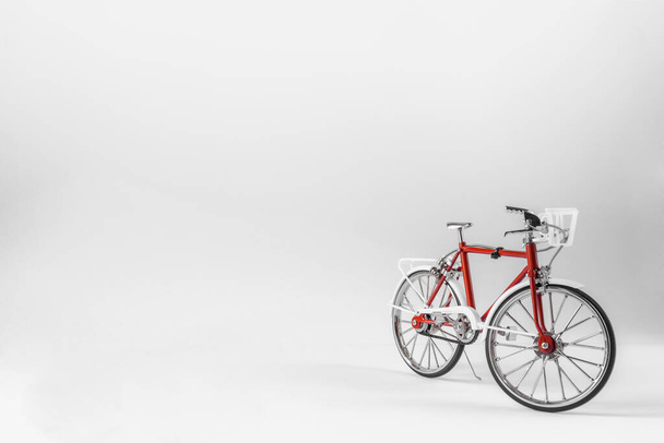 Red bicycle on a white background - Foto, Bild