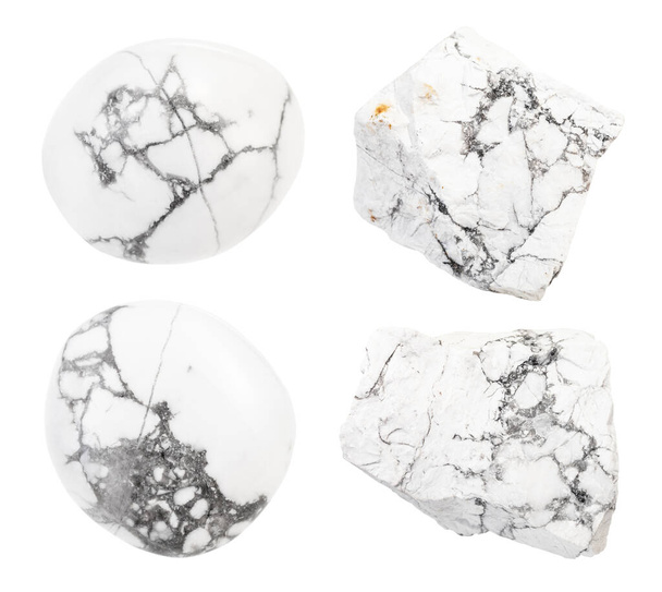conjunto de varias piedras preciosas de Howlite aisladas sobre fondo blanco
 - Foto, Imagen
