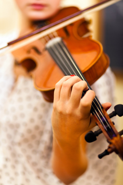 Violin being played by a musician - 写真・画像