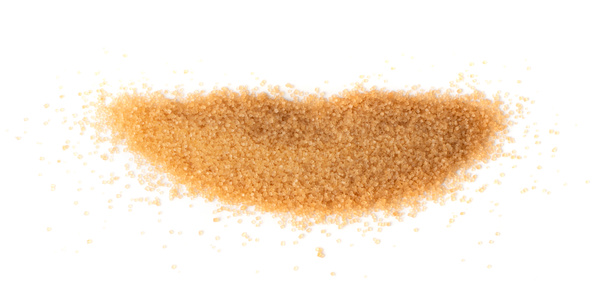 Pile of brown sugar isolated on white background. Raw unrefined cane sugar heap similar to lips top view - Photo, Image