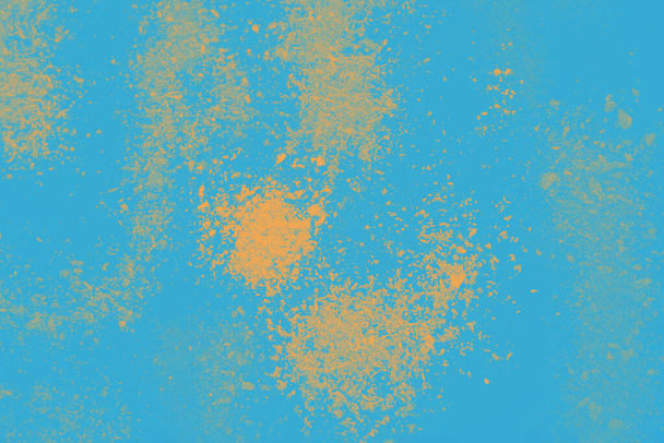 Абстрактный синий фон с пятнами порошка желтого горчичного цвета
 - Фото, изображение