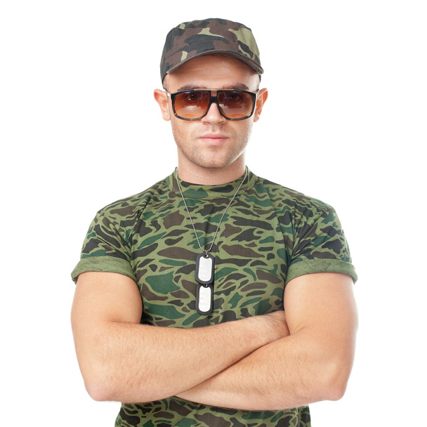 Young army soldier wearing sunglasses - Foto, imagen