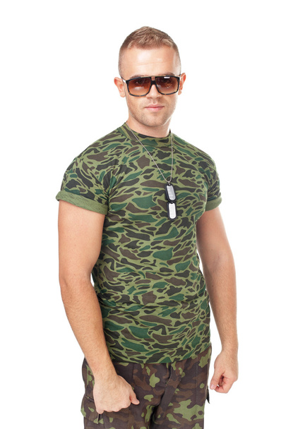 Young army soldier wearing sunglasses - Foto, Imagen