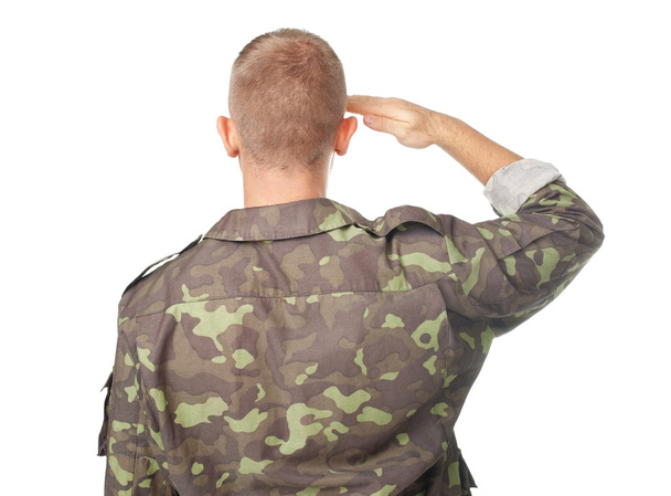 Back view of army soldier saluting - Φωτογραφία, εικόνα