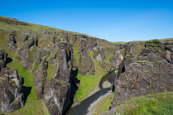 Fjadrargljufur canyon in south Iceland on a sunny summer day - Photo, Image