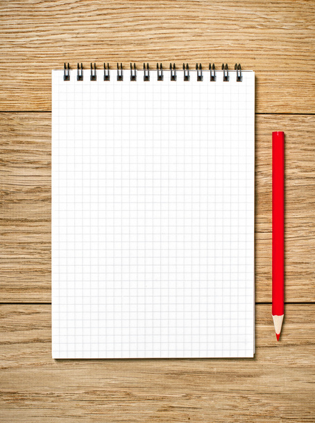 A white note book with lots of room for your text or image and a - 写真・画像
