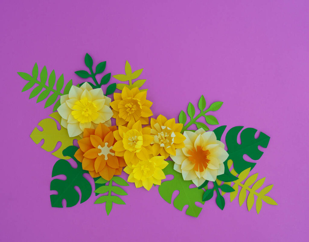 Paper craft Flower Decoration Concept. Flowers and leaves made of paper. Tropics. Pink background. - 写真・画像
