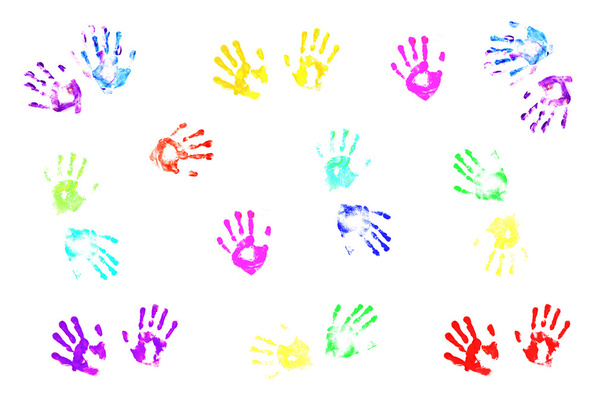 Colorful handprints made by children on white background.; - Fotó, kép