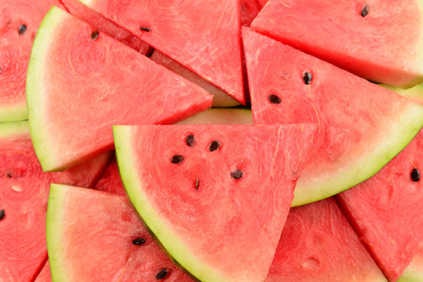 Juicy watermelon slices background. Vista superior.  - Foto, imagen
