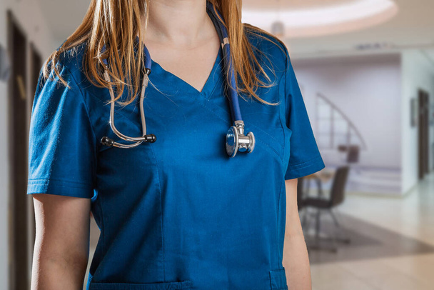 Healthcare and medical concept. Medicine female doctor with stethoscope in the hospital. - Photo, Image