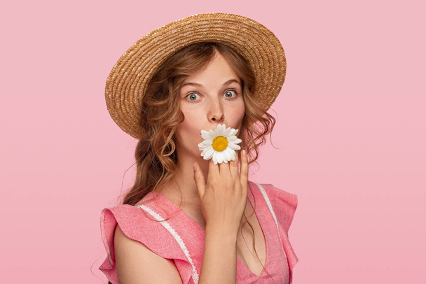 Funny lady with flower in mouth - Foto, Imagen