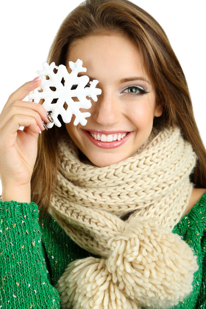 Beautiful smiling girl with Christmas snowflake isolated on white - Foto, afbeelding