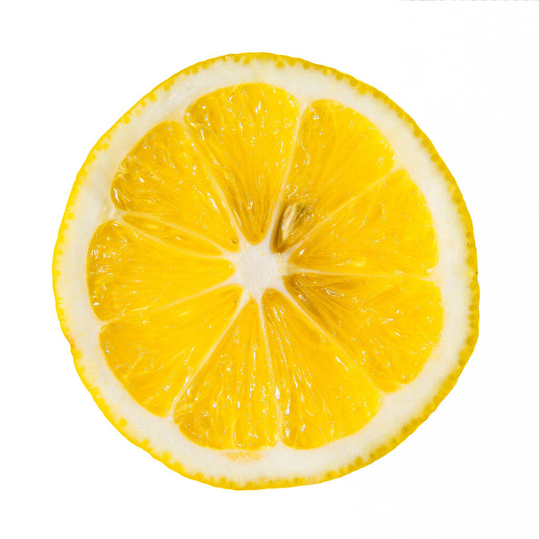 lemon slice, isolated on a white background - Фото, изображение