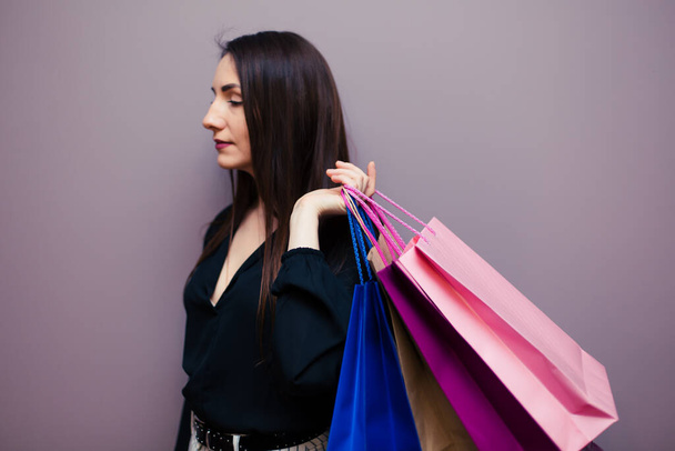attractive happy smiling stylish woman shopaholic holding shopping bags against studio background isolated, colorful, excited for sale, summer fashion trend. - Fotoğraf, Görsel