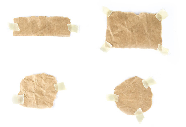 Pedaços de folhas de papel de nota rasgada com fita adesiva colada
 - Foto, Imagem