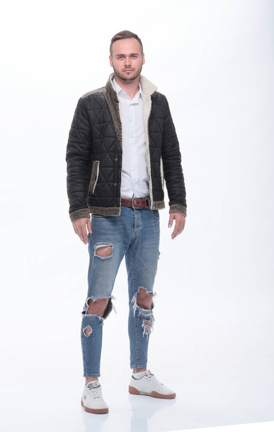 stylový mladý muž v módních džínách. izolované na bílém - Fotografie, Obrázek