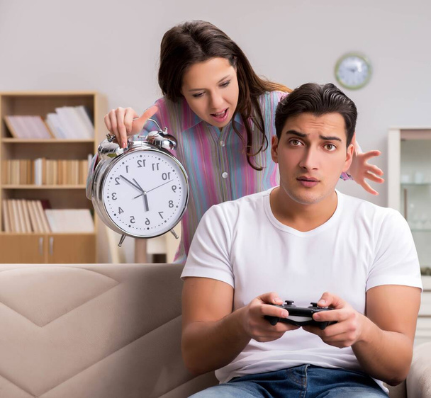 Young family suffering from computer games addiction - Photo, Image