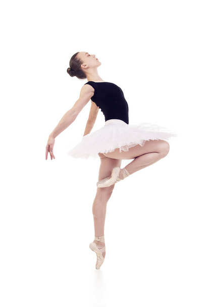 Gorgeous ballerina, in a white tutu dancing ballet. Studio shot on white background , isolated images. - Photo, Image
