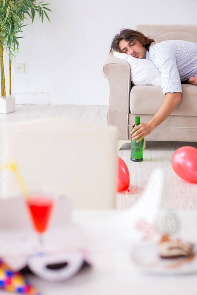 Young man celebrating his birthday at home - Fotografie, Obrázek