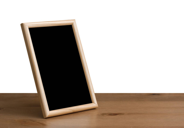 photo frame on table, white backgroud, isolated with clipping path. - 写真・画像