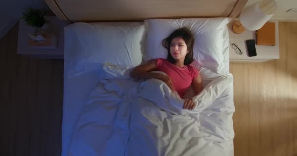 asian woman has insomnia - Materiał filmowy, wideo