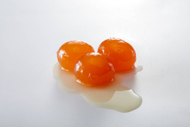 Three salted duck egg yolks closeup - Photo, Image